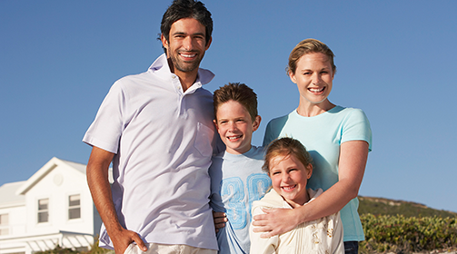 Young family of four outdoors - Free Insurance Quotes